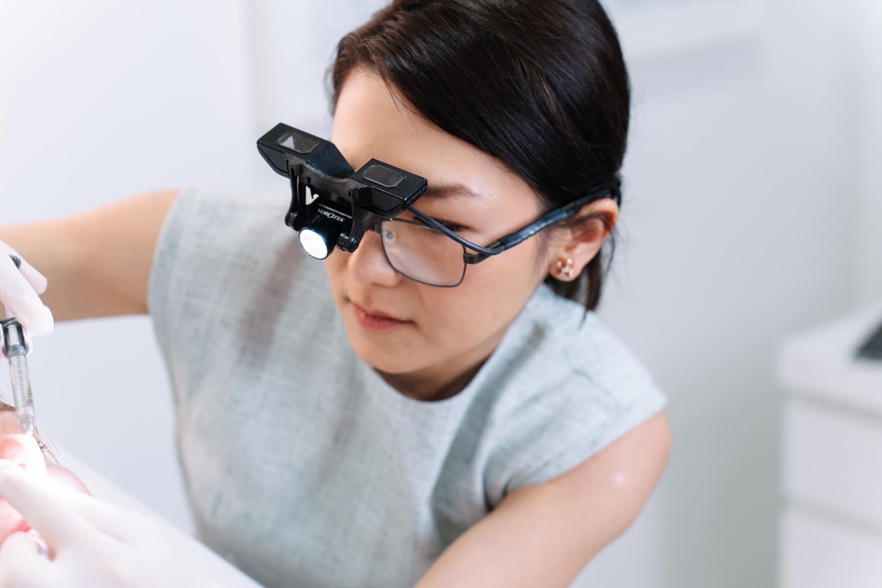 Cosmetic doctor treating a patient at Contour Clinics Brisbane