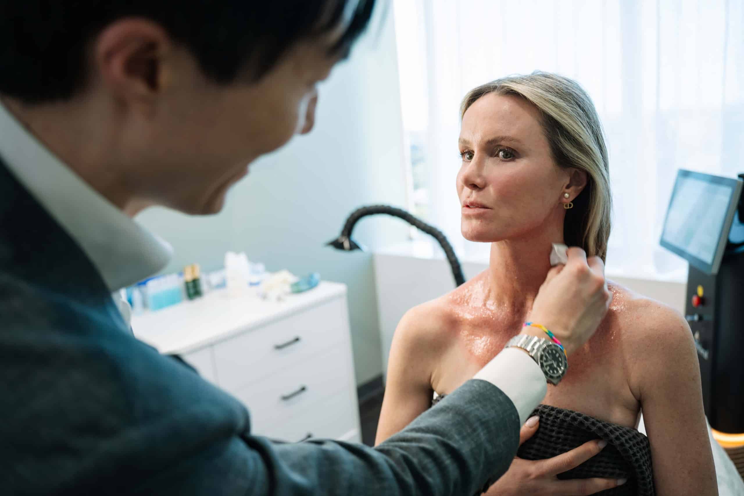 Patient receiving Co2 laser on neck at Miranda cosmetic medicine clinic with Dr Fane